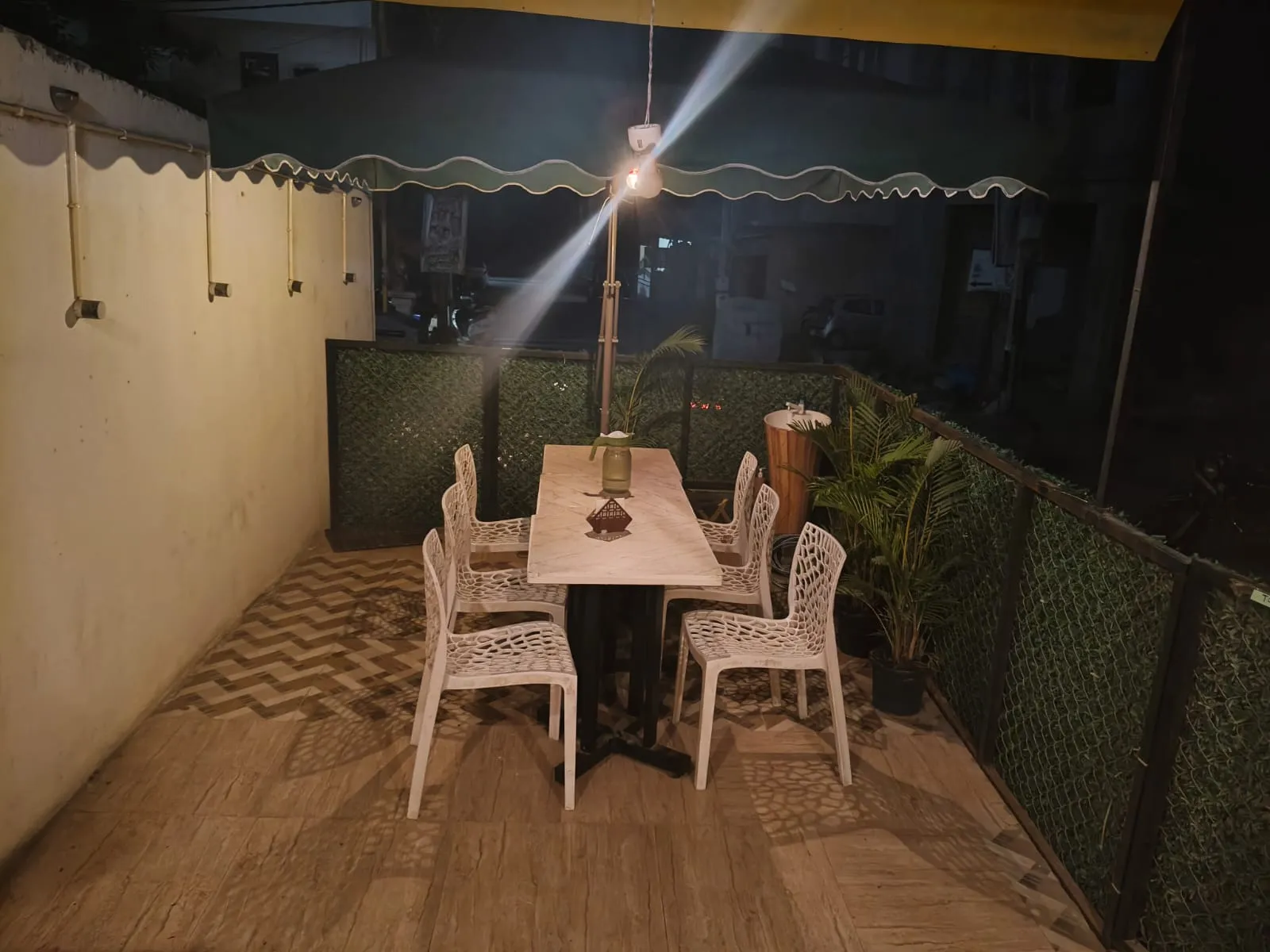 Smokey House's string-lit outdoor patio seating at night